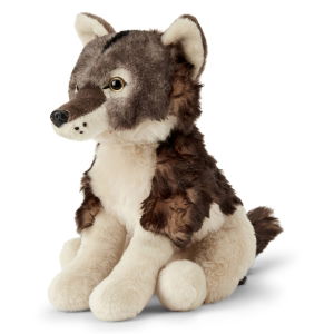 Wolf plush sat against a white background